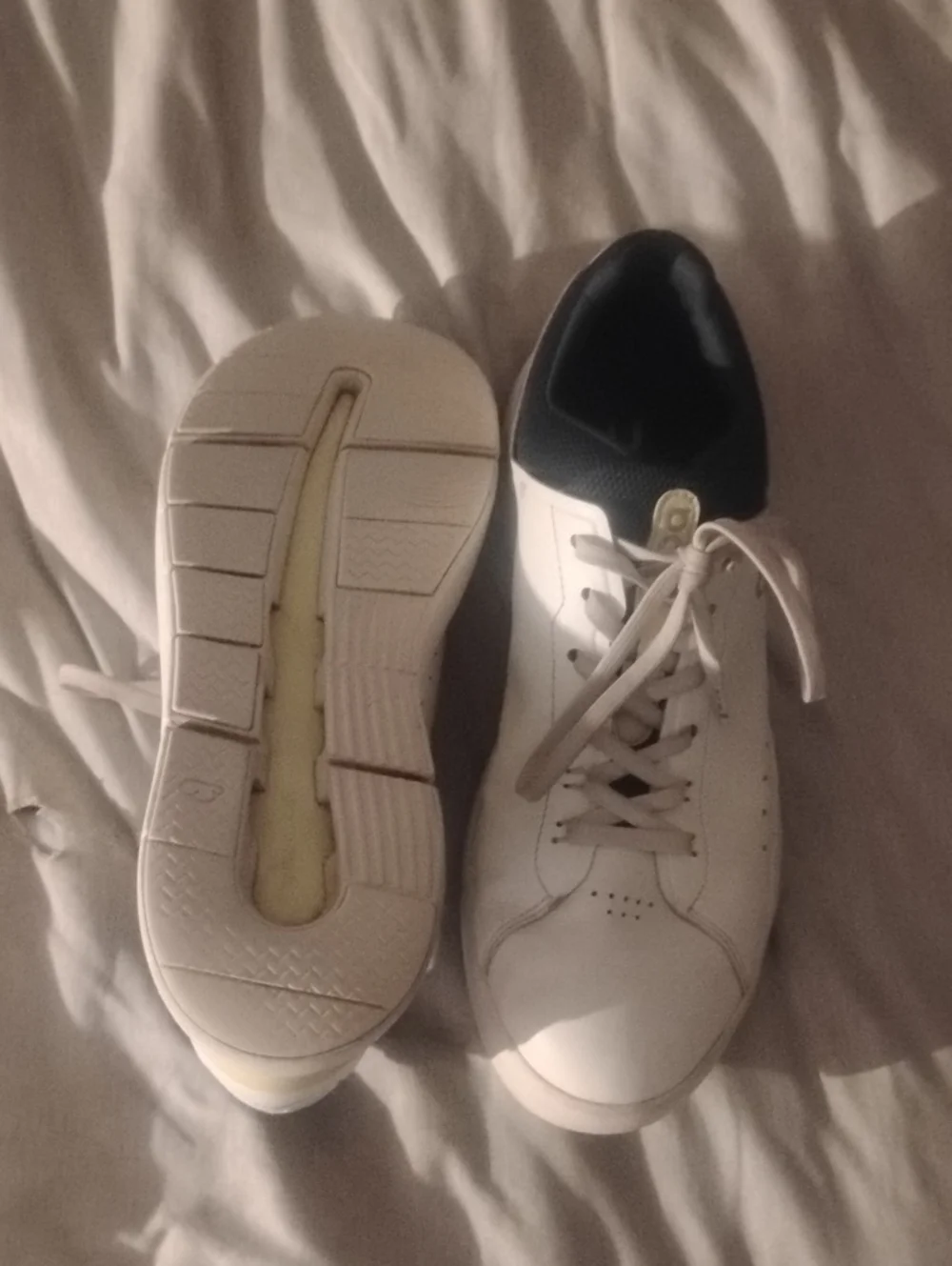On Running The Roger Navy And White With Yellow Accents Size 11.5